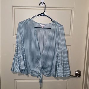 Brand New!! Button up knot blouse. Color light mint with white strips. Size XXL.